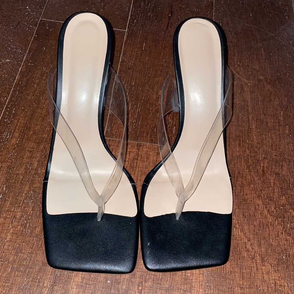 Black clear heels .